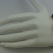 Laden Sie das Bild in den Galerie-Viewer, Vintage Armband mit Tigerauge / 375er - 9 Karat Gelbgold / ca. 19,5 cm