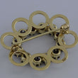 Laden Sie das Bild in den Galerie-Viewer, Vintage Brosche mit Granat - in Blumen-Optik / 333er - 8 Karat Gelbgold