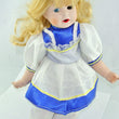 Laden Sie das Bild in den Galerie-Viewer, Puppe mit weis blauem Kleid / Porzellankopf & Stoffkörper / ca. 36 cm