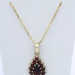 Laden Sie das Bild in den Galerie-Viewer, Vintage Kette & Anhänger mit Granat / 333er 8 Karat Gold 40cm