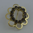 Laden Sie das Bild in den Galerie-Viewer, Vintage Brosche mit Granat - in Blumen-Optik / 333er - 8 Karat Gelbgold