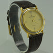 Laden Sie das Bild in den Galerie-Viewer, RAYMOND WEIL Geneve - Herrenuhr / Quarz / Edelstahl vergoldet & Lederarmband