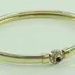 Laden Sie das Bild in den Galerie-Viewer, Vintage Damen Armreif mit Zirkonia & Saphir 585er - 14 Karat Gelbgold