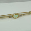 Laden Sie das Bild in den Galerie-Viewer, Vintage Anstecknadel mit Opal & Zirkonia / 333er - 8 Karat Gelbgold