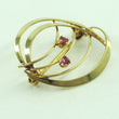 Laden Sie das Bild in den Galerie-Viewer, Vintage Brosche mit Rubine 8 Karat 333er Gold