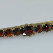 Laden Sie das Bild in den Galerie-Viewer, Vintage-Brosche mit Granat / 333er - 8 Karat Gelbgold