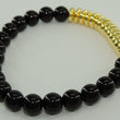 Laden Sie das Bild in den Galerie-Viewer, Unisex elastisches Armband vergoldet mit Perlenoptik 17-21 cm
