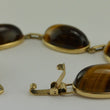 Laden Sie das Bild in den Galerie-Viewer, Vintage Armband mit Tigerauge / 375er - 9 Karat Gelbgold / ca. 19,5 cm
