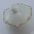 Laden Sie das Bild in den Galerie-Viewer, Vintage Armkette mit "Rosenquarz Kugeln" / 333er - 8 Karat Gelbgold /19,0 cm
