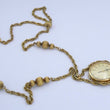 Laden Sie das Bild in den Galerie-Viewer, HALS KETTENUHR AMARA TASCHENUHR MIT KETTE-HANDAUFZUG VERGOLDET

