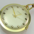 Laden Sie das Bild in den Galerie-Viewer, Vintage Adora Taschenuhr Handaufzug mit Kette vergoldet 23cm
