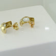 Laden Sie das Bild in den Galerie-Viewer, Vintage Ohrringe mit Zirkonia / 333er - 8 Karat Gelbgold
